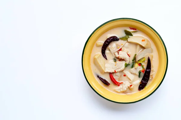 Thai food, Coconut milk soup with chicken on white background. Copy space