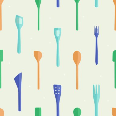 Işık arka plan üzerinde renkli tahta kaşıklar