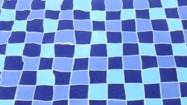 Refraction in swimming pool water. — Stock Video