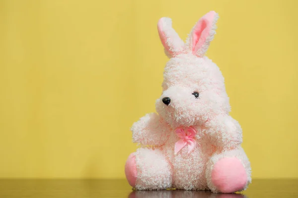 Pink bunny doll Brown background — Stock Photo, Image