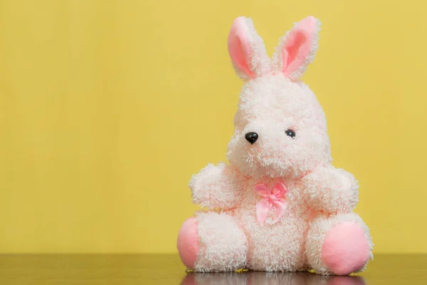 Pink bunny doll Brown background — Stock Photo, Image
