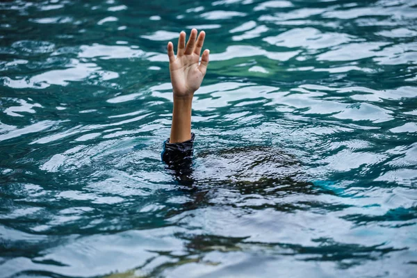 Drowning people raise hands for help in the pool. — Stock Photo, Image