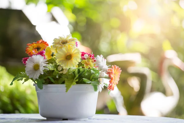 Bouquet in a white pot on a table — Stock Photo, Image