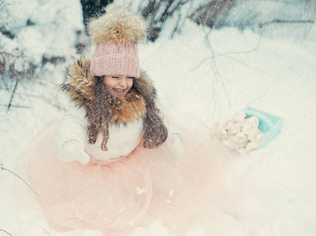 snowy winter and a girl in a cap