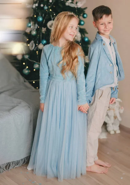 Boy with the girl in the blue dress — Stock Photo, Image