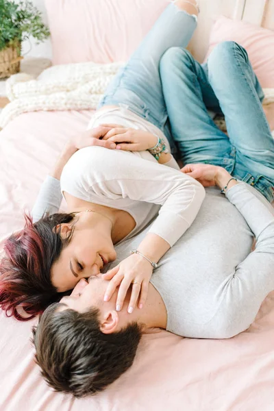 Couple in love on the bed — Stock Photo, Image
