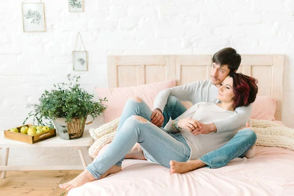 Couple in love on the bed — Stock Photo, Image