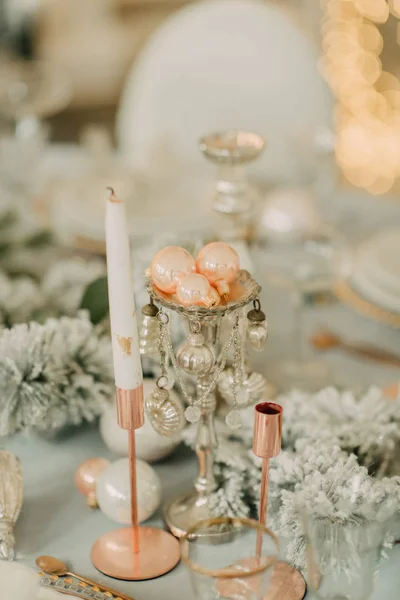 decorated New Year\'s table in light turquoise colors