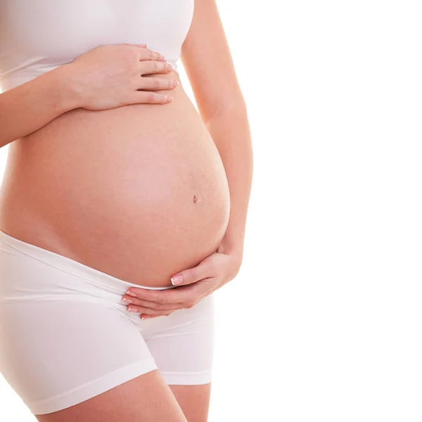 Beeld van een zwangere vrouw die haar dikke buik aanraakt. Sluit maar af. Moederschap, zwangerschap, mensen en verwachtingen. Zwangere vrouw verwacht baby — Stockfoto