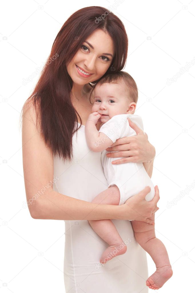 Happy family, mother holding her baby, isolated on white background. Portrait of mother and cute baby in white. Happy pretty woman holding sweet baby. Motherhood, people and family concept