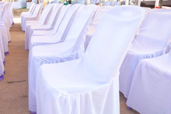 White cape on party chair