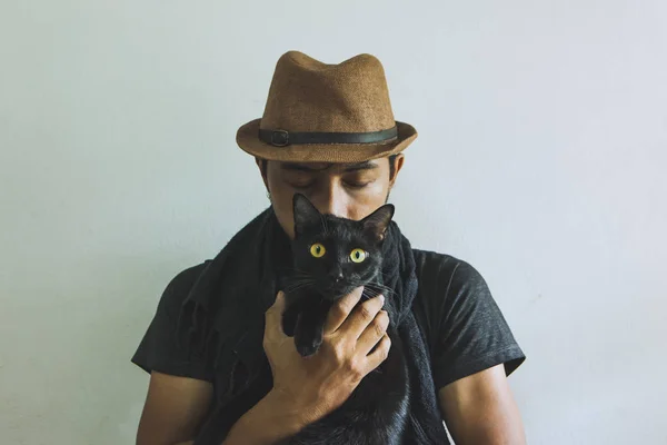 Portrait of a  Love to animals with black cat. — Stock Photo, Image