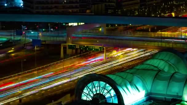 Nocny timelapse miejskiej ulicy w Ariake Tokio daleki strzał — Wideo stockowe