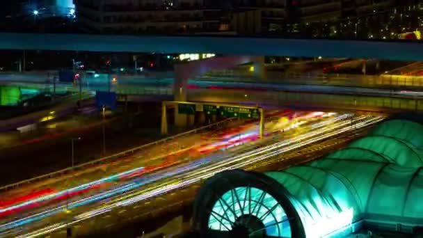 Nocny timelapse miejskiej ulicy w Ariake Tokio daleki strzał — Wideo stockowe