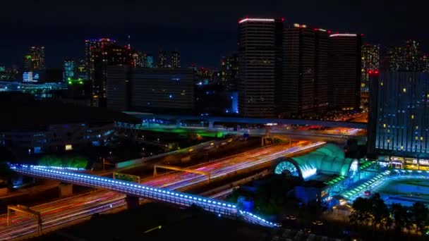 A night timelapse of the city street in Ariake Tokyo wide — Stock Video