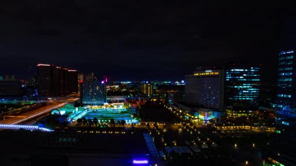 Een avond timeapse van de stad landschap bij de stedelijke stad in Ariake Tokio brede shot — Stockvideo