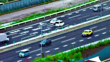 Ariake Tokyo 'nun şehir merkezindeki şehir sokağının gündüz kuşağı çekimleri.