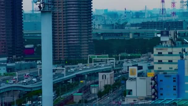 Een timelapse van de stad straat bij de stedelijke stad in Ariake Tokio dag lange schot — Stockvideo