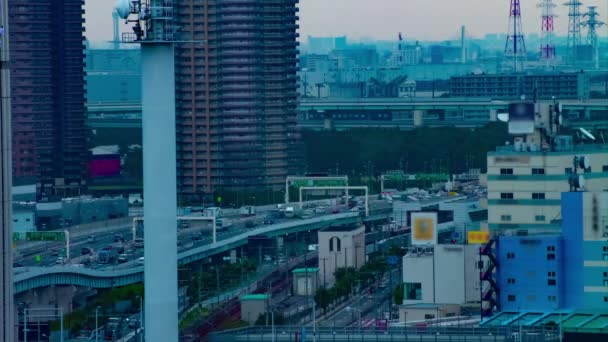 Een timelapse van de stad straat bij de stedelijke stad in Ariake Tokio dag lange schot — Stockvideo