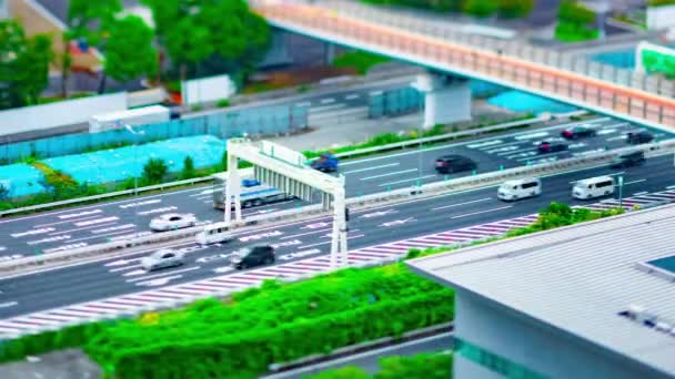 Хронология городской улицы в городском городке, как миниатюра в дневной смене наклона Ариаке Токио — стоковое видео