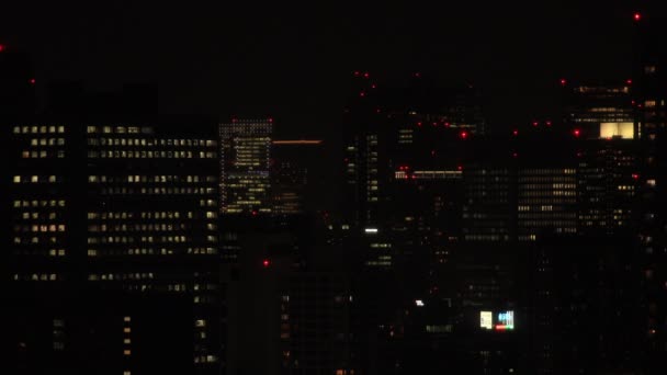 Uma paisagem urbana noturna em Shinagawa Tóquio tiro longo ângulo alto — Vídeo de Stock