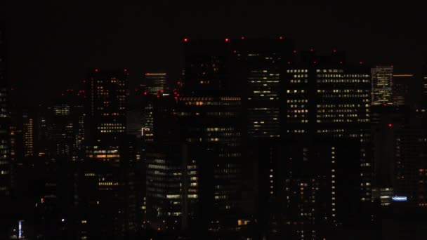 Uma paisagem urbana noturna em Shinagawa Tóquio tiro longo ângulo alto — Vídeo de Stock