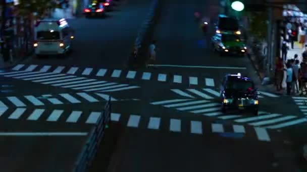 A night timelapse of the neon street in Shinjuku Tokyo high angle tiltshift — Stock Video