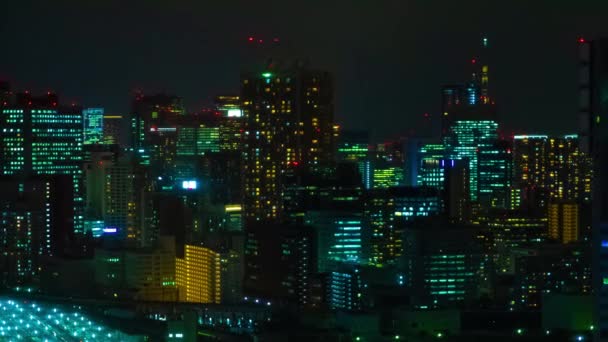 Nocny timelapse panoramicznego wglądu na miejskim mieście w Tokio wysoki kąt długi strzał — Wideo stockowe
