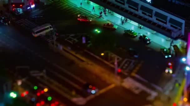 En natt timelapse av panoramautsikt över staden i Tokyo hög vinkel tilt skift — Stockvideo
