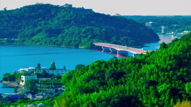 Timelapse Okuhamana jezioro pobliżu mostu wysoki kąt tiltshift tiltshift — Wideo stockowe
