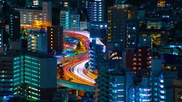 Un lapso de tiempo de la noche de la carretera en la ciudad urbana de Tokio tiro largo — Vídeo de stock