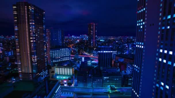 Noční čas na městskou krajinu v Tokiu širokým obloukem — Stock video