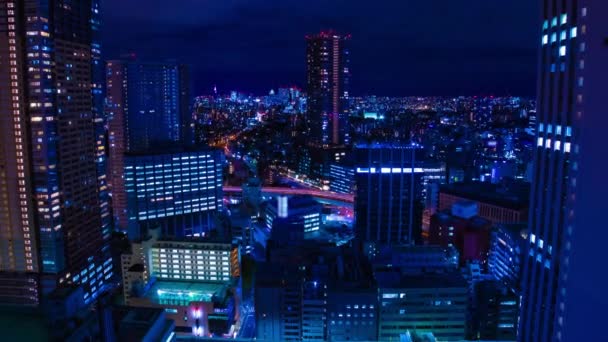 Een avond timelapse van de stad landschap bij de stedelijke stad in Tokio wijd shot zoom — Stockvideo