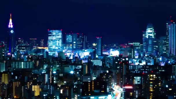 En natt timelapse av stadsbilden på den urbana staden i Tokyo bred skott zoom — Stockvideo