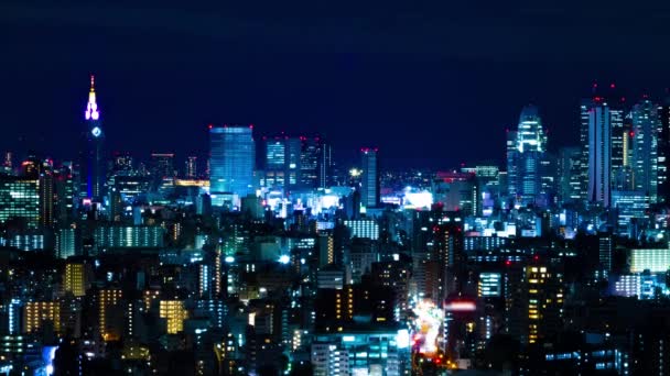 Nocny timelapse miejskiego krajobrazu na miejskim mieście w Tokio szeroki strzał — Wideo stockowe