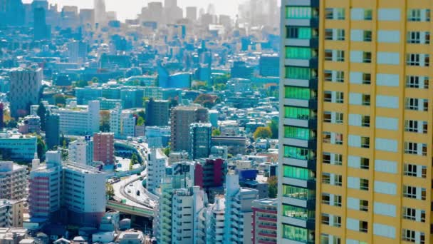 Un timelapse de autopista en la ciudad urbana de Tokio inclinación desplazamiento panorámico — Vídeo de stock