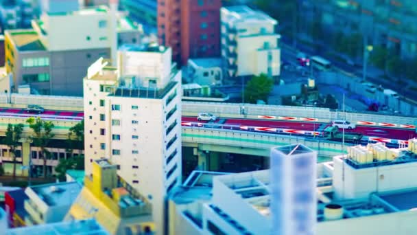 A timelapse of highway at the urban city in Tokyo tiltshift zoom — Stock Video