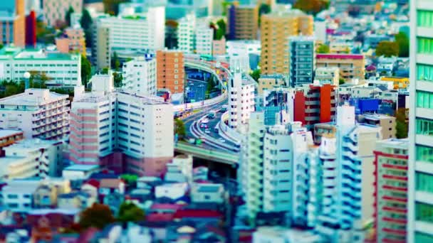 A timelapse of highway at the urban city in Tokyo tiltshift zoom — 비디오