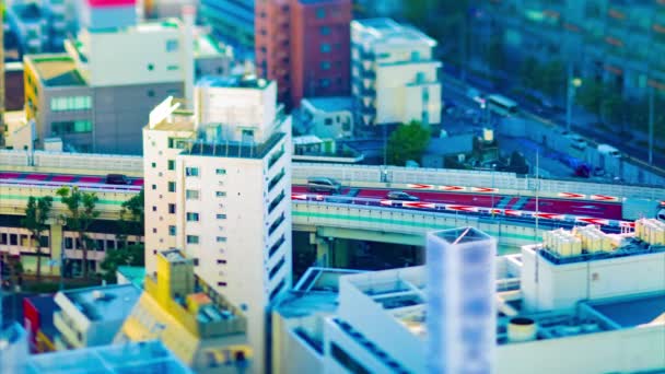 A timelapse of highway at the urban city in Tokyo tiltshift — Stock Video