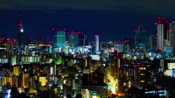 A dawn timelapse of cityscape in Tokyo high angle wide shot zoom — Stock Video