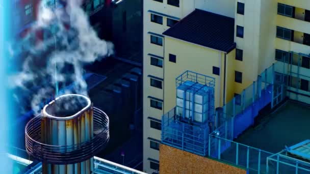 Smoke time lapse at the chemney in the urban city in Tokyo panning — Stock Video