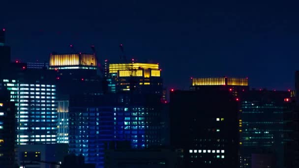 A night timelapse of cityscape at the urban city in Tokyo long shot zoom — Stock Video