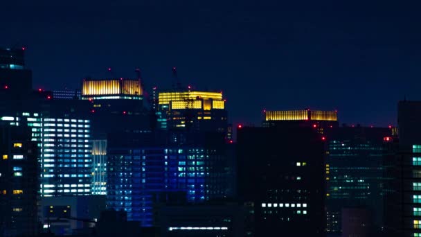Uma cronologia noturna da paisagem urbana na cidade urbana de Tóquio — Vídeo de Stock