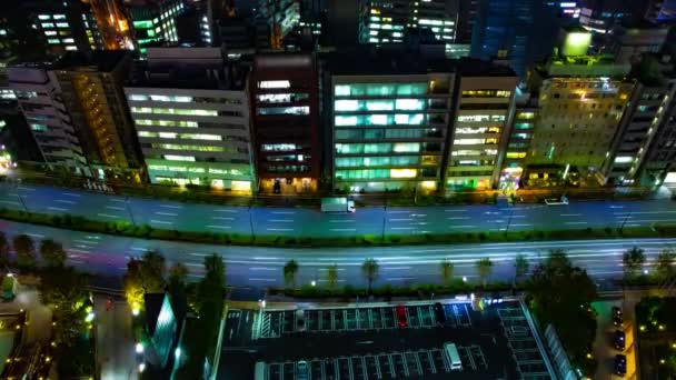 Uma noite timelapse de rua na cidade urbana em Tóquio ampla inclinação tiro — Vídeo de Stock