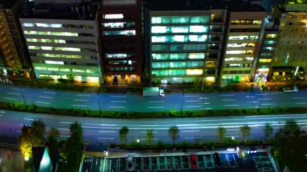 Ein nächtlicher Zeitraffer der Straße in der Stadt in Tokio Weitwinkelzoom — Stockvideo