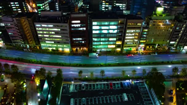 Ein nächtlicher Zeitraffer der Straße in der städtischen Stadt in Tokio Weitwinkel — Stockvideo