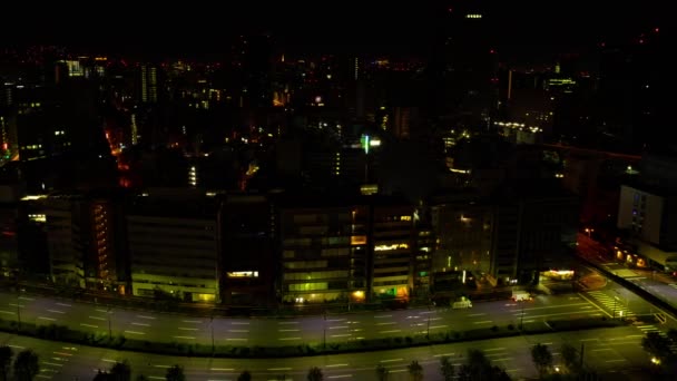 Świt timelapse miejskiego krajobrazu w Tokio wysoki kąt szeroki strzał panning — Wideo stockowe