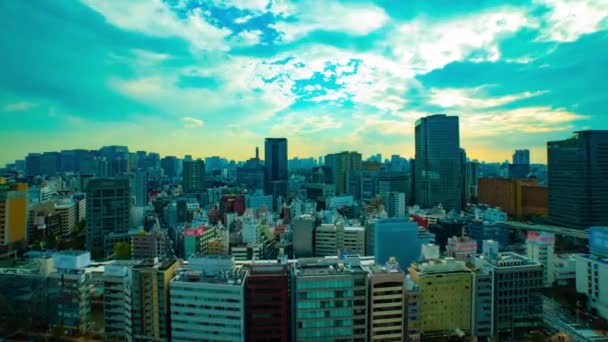 A timelapse of cityscape at the urban city in Tokyo wide shot high angle zoom — 비디오