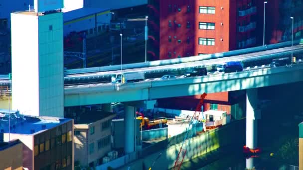 東京都内の街並のタイムラプス高角度ロングショット傾き — ストック動画
