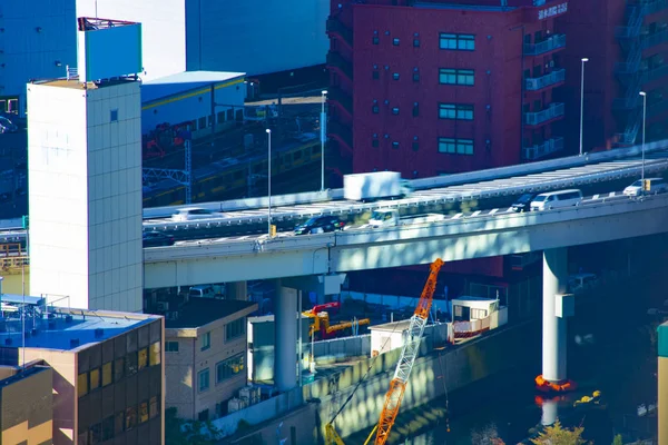 Een rijweg straat op de stedelijke stad in Tokio lange shot hoge hoek — Stockfoto